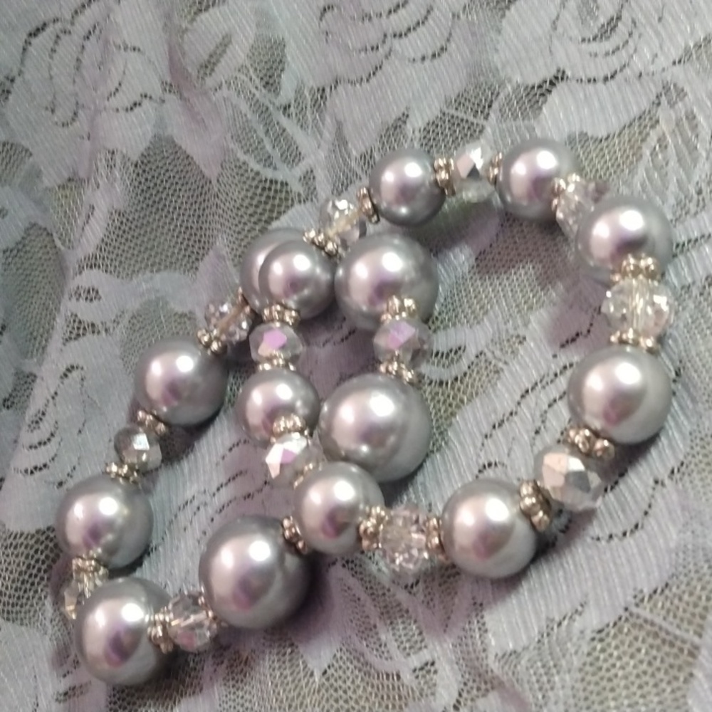 Pair of chunky silver tone bracelets